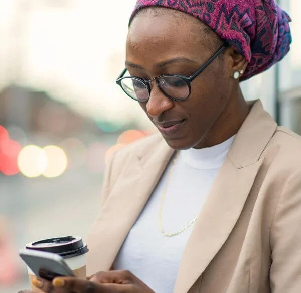 Women texting. Kid Breukelen Realty Group